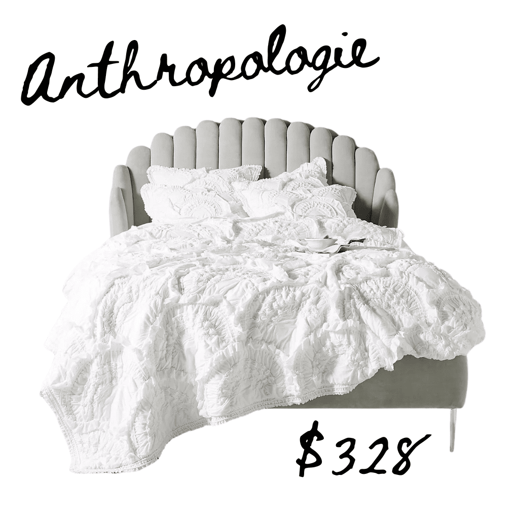 Anthropologie rivulets quilt on gray upholstered bed